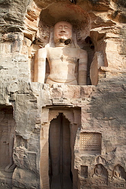 Standing Jain sculpture of Adinath carved in to the cliff on the southern approach to the fort, Gwalior, Madhya Pradesh, India