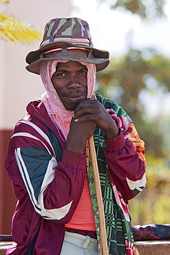 Man with hats in Ambalavao, Fianarantsoa Province, Madagascar