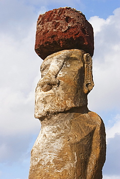 Moai with Pukau (stone hat), restored by archaeologist Claudio Cristino, at Ahu Tongariki at dawn, Rapa Nui (Easter Island), Chile