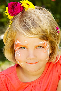 Hawaii, Young girl wearing facepaint.