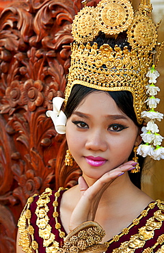 Cambodia, Siem Reap, Close up of young woman wearing traditional dancer attire.