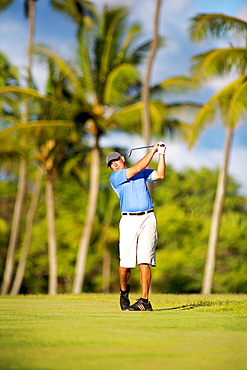 Hawaii, Maui, Maui Country Club, Man enjoys a day of golf during his vacation.