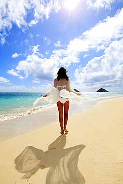 Hawaii, Oahu, Lanikai, Beautiful woman on the beach.