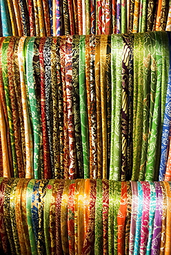 Indonesia, Bali, Ubud, Silk scarves for sale at market.