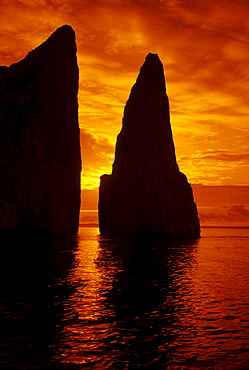 Galapagos, Orange sunrise over Kicker Rock.