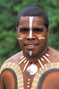 Australia, Queensland, Cairns, Tjapukai, Portrait of Aboriginal native man with paint on body.