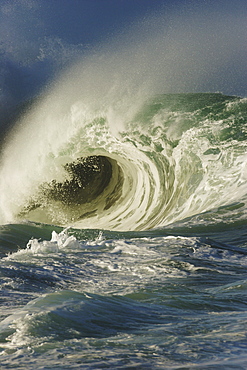 Hawaii, Oahu, North Shore, Waimea Bay, Wild and crashing shorebreak.