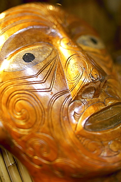 French Polynesia, Tahiti, Bora Bora, Close-up of the carved face of a wooden statue