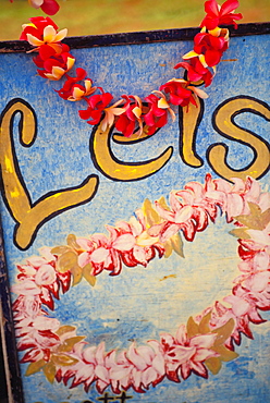 Hawaii, Big Island, Hilo, Lei and flower stand sign