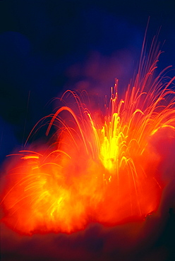 Hawaii, Big Island, Hawaii Volcanoes National Park, lava exploding as flow hits ocean, nighttime A28G