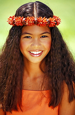 Young Hawaiian girl with orange haku.