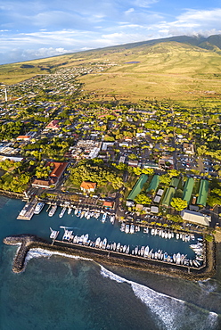 An aerial view of Lahaina harbor and town including the Pioneer Inn and West Maui Mountains, Maui, Hawaii, USA. Three images were combined for this panorama, Lahaina, Maui, Hawaii, United States of America