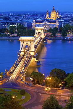 Chain Bridge, Four Seasons Hotel, Gresham Palace and St. Stephen's Basilica at dusk, UNESCO World Heritage Site, Budapest, Hungary, Europe