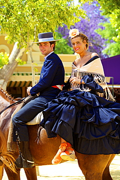 Spanish horse riders in traditional dress at annual Horse Fair, Jerez de la Frontera, Cadiz Province, Andalusia, Spain, Europe