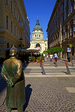 Statue of Policeman with St. Stephen's Basilica, Budapest, Hungary, Europe 