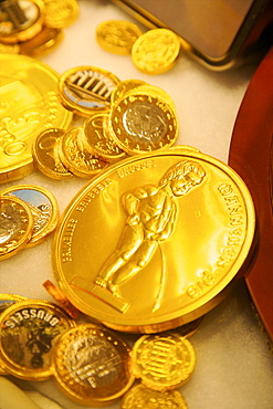 Manneken Pis coin in a sweet shop, Brussels, Belgium, Europe