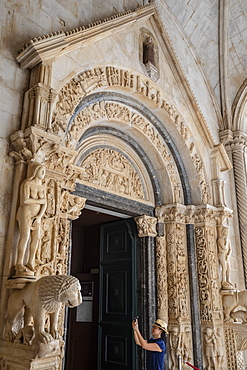 Stone carving outside The Cathedral of St. Lawrence, Trogir, UNESCO Wold Heritage Site, Croatia, Europe