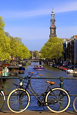 Westerkerk Tower and Prinsengracht Canal with bicycle, Amsterdam, Netherlands, Europe