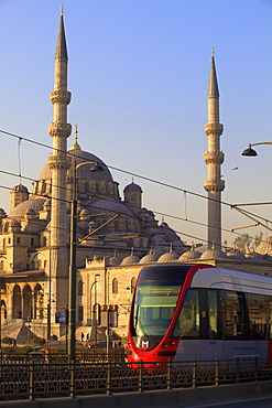 Tram with New Mosque in background, Istanbul, Turkey, Europe