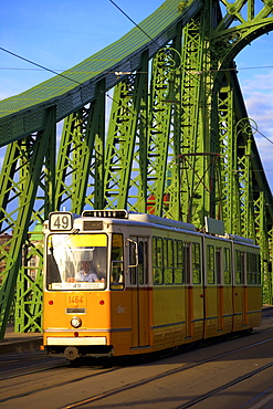 Liberty Bridge and tram, Budapest, Hungary, Europe