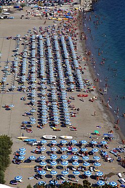 Blue and yellow parasols on beach, Amalfi Drive, UNESCO World Heritage Site, Campania, Italy, Europe