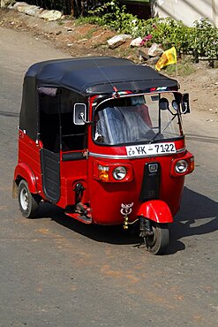 Red tuk-tuk, Matale, Sri Lanka, Asia