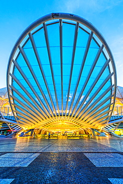 Oriente train station at twilight, Parque das Nacoes (Park of the Nations), Lisbon, Portugal, Europe