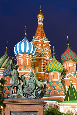 St. Basil's Cathedral and the statue of Kuzma Minin and Dmitry Posharsky lit up at night, UNESCO World Heritage Site, Moscow, Russia, Europe