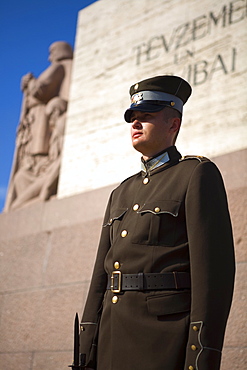 Soldier in front of the Latvian Freedom Monument, Riga, Latvia, Europe