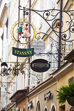 Ornate shop signs on Getreidegasse, Salzburgs bustling shopping street, Salzburg, Salzburger Land, Austria, Europe