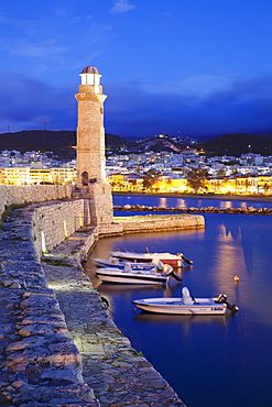 Lighthouse at old Venetian harbour, Rethymno (Rethymnon), Crete, Greek Islands, Greece, Europe