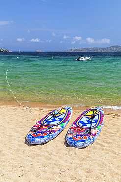 Brightly coloured paddleboards, Porto Pollo Beach, Porto Puddu, Gallura, Sardinia, Italy, Mediterranean, Europe