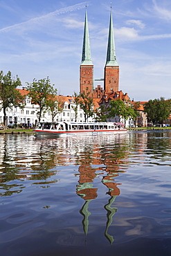 Excursion boat on the River Trave and cathedral, Stadttrave, Lubeck, Schleswig Holstein, Germany, Europe