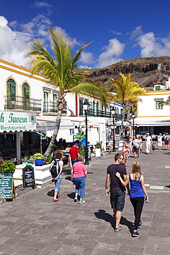 People walking on a promenade, Puerto de Mogan, Gran Canaria, Canary Islands, Spain, Europe