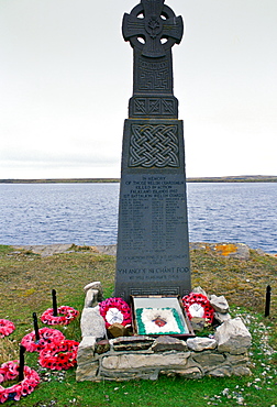 Welsh Guards Memorial - a Welsh cross -  at Fitzroy Cove, Falkland Islands