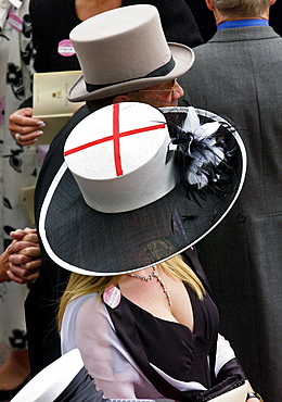 Race-goer wearing a hat showing the St George's flag for England at Royal Ascot Races