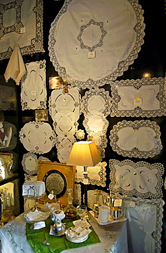 Display of white linen in draper's shop in Kloskanthuis, Ghent, Belgium