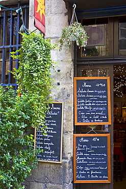 French menus outside cafe restaurant in Bordeaux, France.