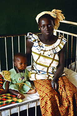 Young mother  with her child in hospital, Gambia