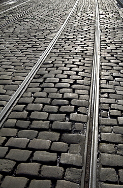 Tram tracks in cobbled street  in Korenmarkt, Ghent, Belgium