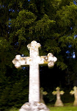 Gravestones in churchyard at All Saints Church in Church Lench, Worcestershire, UK