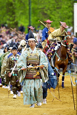 Japanese horseman and traditional dancers in costume at the japanese exhibition ' matsuri japan in the park '  in hyde park, london.