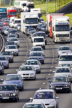 Traffic congestion cars and trucks in all carriageways on M25 motorway, London, United Kingdom