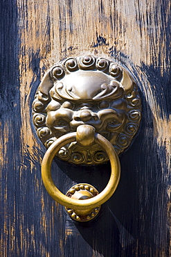 Lion-head knocker on door in the Yu Gardens, Shanghai, China