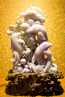 Lavender jade dolphins ornament on display in the Huahui Jade Factory and Showroom, Xian, China