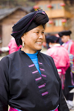 Woman from Yao minority nationality with traditional long hair according to folk custom, Ping An, Guilin, China