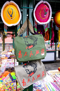 Souvenir stall selling bags printed with portraits of Chairman Mao, Beijing, China