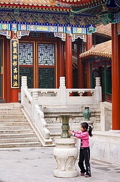 Young girl at The Summer Palace, Beijing. China has a one child family planning policy to limit population.