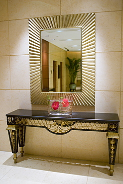 Mirror and console table in the hallway of the Beijing Hotel, official host hotel for Beijing Olympic Games, China