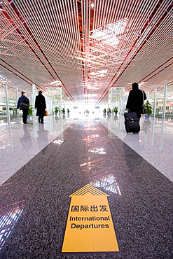 Departures sign inside Terminal Three of Beijing Capital International Airport, China